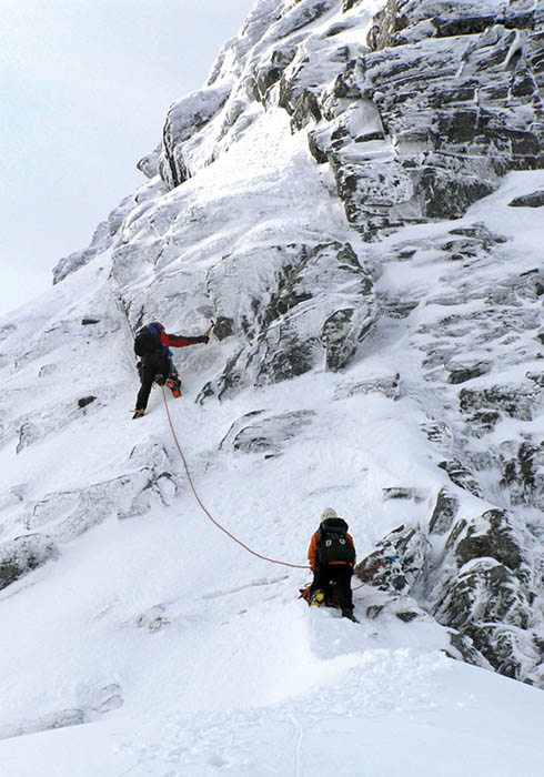 Climbing the Little Tower of Tower Ridge (IV 3) in well-banked-out conditions. Giles Trusell